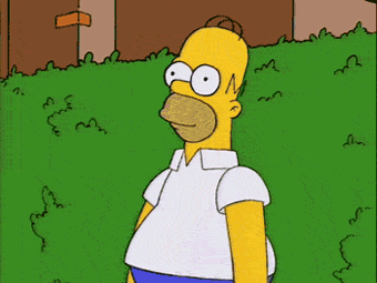 Homer Simpson backs into a hedge until he disappears.